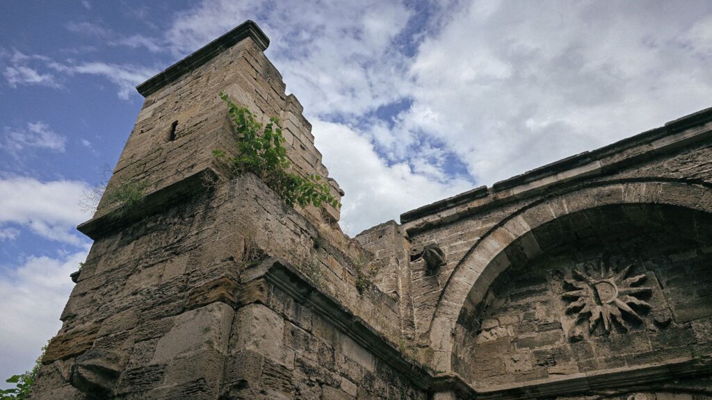 Detail of a medieval fortress gate after rain at sunset capturing slow travel in Vidin, Bulgaria